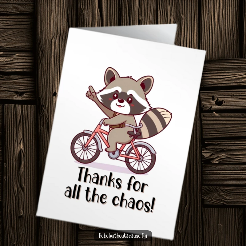 Funny Free Printable Thank You Card: Kawaii raccoon rides a tiny bicycle backwards with a cheeky salute, expressing thanks.